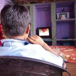 A family in a village watch Simpa Magic TV, the country's first solar-powered satellite television service in their home in Mathura district in Uttar Pradesh. (HANDOUT/SIMPA NETWORKS)