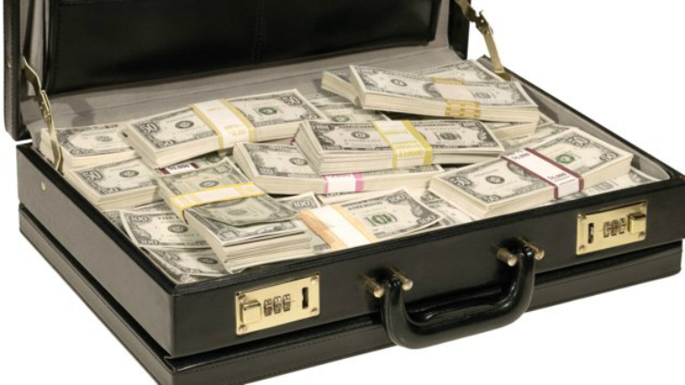 Getty_W_112211_SuitcaseMoney