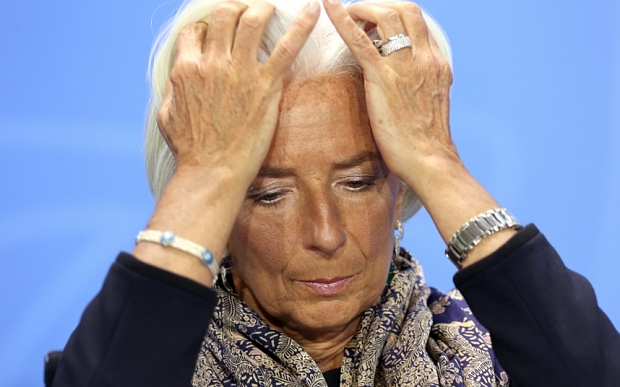 FILE - 17 December 2015: Head of IMF  Christine Lagarde is to stand trial in France for alleged negligence over a multi million payment to businessman Bernard Tapie in 2008 during her time as French Finance Minister. BERLIN, GERMANY - MAY 13:  Managing Director of the International Monetary Fund (IMF) Christine Lagarde listens at a news conference in the German federal Chancellery on May 13, 2014 in Berlin, Germany. World finance, economic and labor leaders met with the German chancellor today, after a weekend upon which she reiterated her stance on the importance of regulation of global finance markets.  (Photo by Adam Berry/Getty Images)