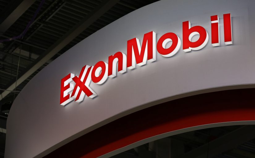 A logo sits illuminated outside the Exxon Mobil Corp. corporate pavilion during the 21st World Petroleum Congress in Moscow, Russia, on Monday, June 16, 2014. Work between Texas-based Exxon, the world's largest oil company by market value, and state-run Rosneft on Sakhalin Island in Russias Far East provides a template for further exploration, especially in the Arctic's Kara Sea, Exxon Mobil Corp. Chief Executive Officer Rex Tillerson said at the World Petroleum Congress in Moscow today. Photographer: Andrey Rudakov/Bloomberg via Getty Images