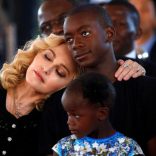 US singer Madonna embraces her adopted son, David Banda ahead of the opening of the Mercy James hospital in Blantyre, Malawi, July 11,2017. Reuters/Siphiwe Sibeko