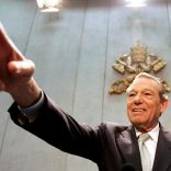 FILE PHOTO: The Pope's official spokesman Joaquin Navarro-Valls gestures during a news conference in the Holy See press office at the Vatican February 10, 2005. REUTERS/Max Rossi/File Photo