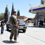 Lebanese army soldiers patrol a street at the entrance of the border town of Arsal, in eastern Bekaa Valley, Lebanon June 30, 2017. REUTERS/Hassan Abdallah