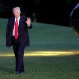 U.S. President Donald Trump waves as walks on the South Lawn of the White House upon his return to Washington, U.S., from the G20 Summit in Hamburg, July 8, 2017. REUTERS/Yuri Gripas