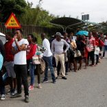 People queue to register for tertiary studies at Thekweni FET College in Durban, South Africa, January 18, 2017. REUTERS/Rogan Ward