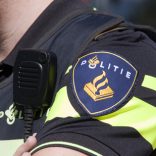Amsterdam,netherlands-may 17, 2015:  Dutch police badge and radio walkie talkie