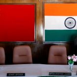FILE PHOTO: A man walks inside a conference room used for meetings between military commanders of China and India, at the Indian side of the Indo-China border at Bumla, in the northeastern Indian state of Arunachal Pradesh, November 11, 2009.  REUTERS/Adnan Abidi/File Photo