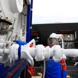 FILE PHOTO: LNG is transferred from an on-shore ISO tank onto a vessel in Singapore May 2, 2017   REUTERS/Mark Tay/File Photo