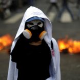 A demonstrator looks on while rallying against Venezuela's President Nicolas Maduro's government in Caracas, Venezuela, August 4, 2017. REUTERS/Ueslei Marcelino