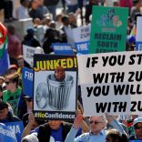 Anti-Zuma protesters march ahead of the vote of no confidence against President Jacob Zuma in Cape Town, South Africa, August 8, 2017.    REUTERS/Mike Hutchings