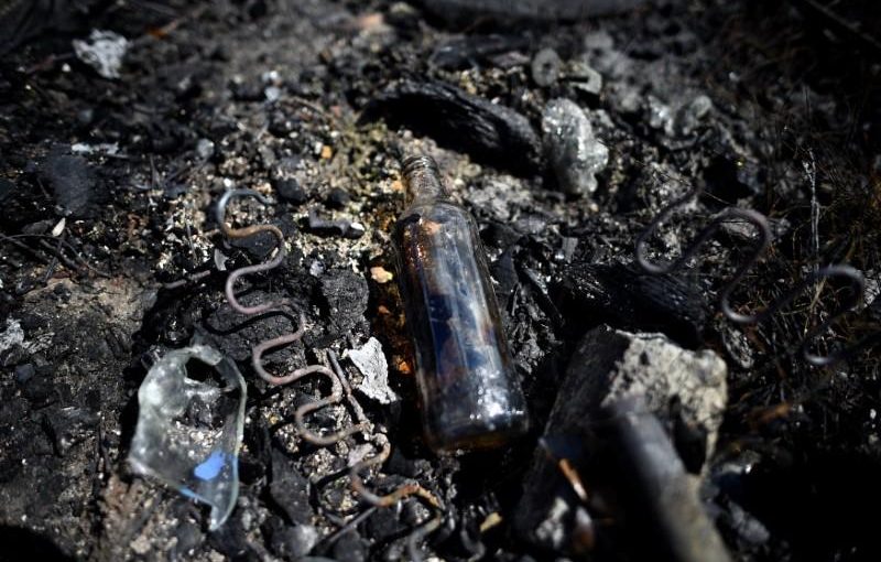 Charred remains of a bonfire is seen in the New Lodge flats area off North Queen Street in Belfast, Northern Ireland August 9, 2017. REUTERS/Clodagh Kilcoyne