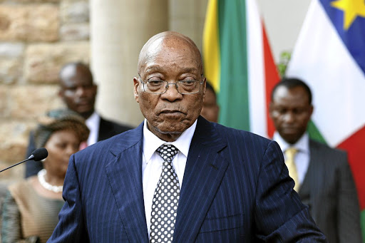South African President Jacob Zuma gives a press conference during an official visit of the President of the Central African Republicon April 5, 2017 at the Sefako M Makgatho Presidential Guesthouse in Pretoria.South Africa's ruling ANC party on April 5, 2017, expressed support for President Jacob Zuma after senior members openly criticised his cabinet reshuffle, citing fears of worsening corruption and economic crisis. / AFP PHOTO / PHILL MAGAKOE