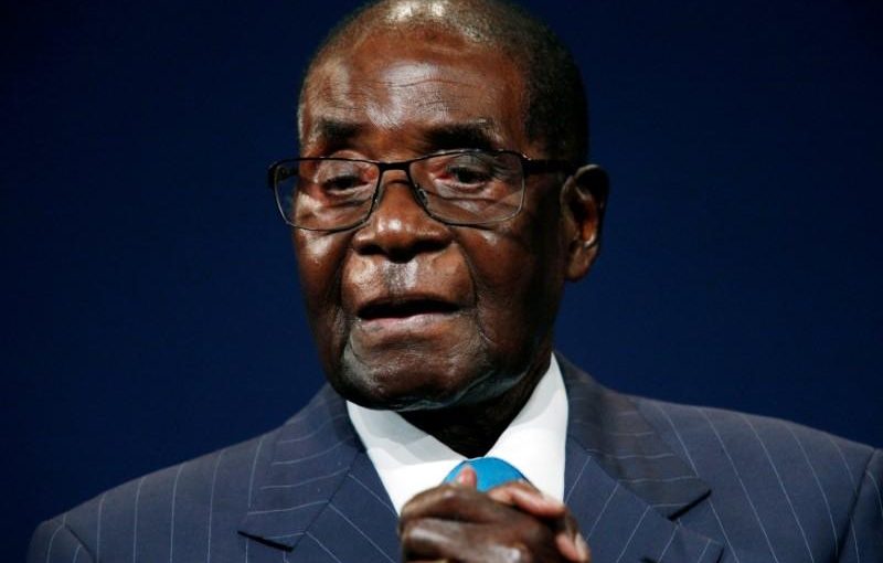 FILE PHOTO - Zimbabwean President Robert Mugabe leaves the stage after participating in a discussion at the World Economic Forum on Africa 2017 meeting in Durban, South Africa May 4, 2017. REUTERS/Rogan Ward/File Photo