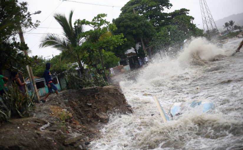 Waves crash against the shore in Puerto Plata. REUTERS/Ivan Alvarado