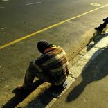 A South African job seeker waits for work at an informally designated roadside site in Cape Town. Each day thousands of unemployed men wait at the sites scattered
across the city in the hope of gaining casual work in the construction and
farming industries. Employers in passing trucks offer the chance of work and
a R60 ($8) payday for some, but for others it is a long futile wait. With
unemployment estimated as high as 40 percent, job creation has been
identified as a priority for the South African economy. - PICTURE : REUTERS/Mike Hutchings    PP03090004

MH/ - RTR2CZ3