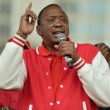 Kenya's President Uhuru Kenyatta (L) of the Jubilee Party addresses his supporters on May 29, 2017 in Nairobi after receiving the clearance certificate of the Independent Electoral and Boundaries Commission (IEBC) following the presentation of his candidacy for the presidential race. / AFP PHOTO / SIMON MAINA        (Photo credit should read SIMON MAINA/AFP/Getty Images)