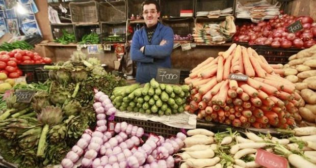 A vegetable vendor waits for customers at the Bab El Oued market in Algiers, file.   REUTERS/Louafi Larbi