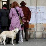 People wait in a line to vote at a polling station in Rome, Italy March 4, 2018. REUTERS/Yara Nardi