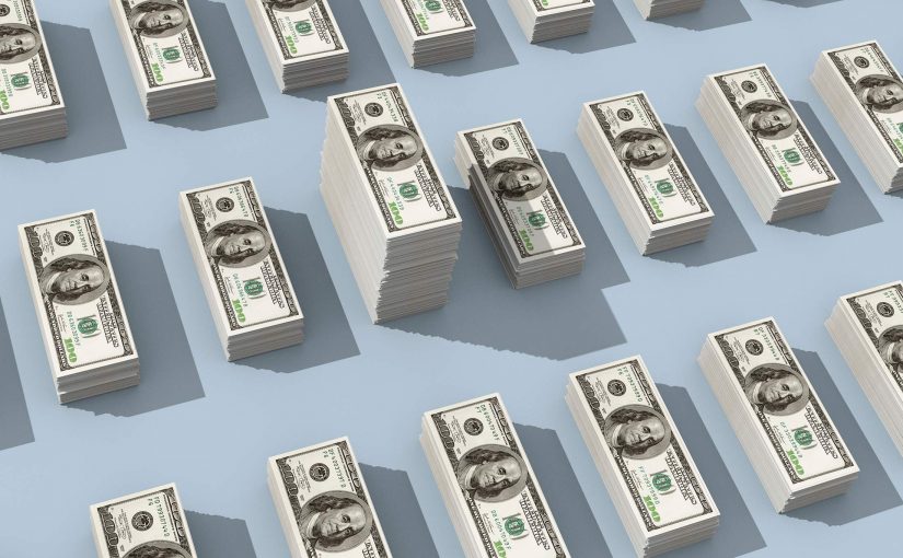 Stacks of 100 dollar bills