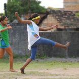 Girls play football in a schoolyard in the city of Olinda in the north-eastern state of Pernambuco. The game was organized by the local NGO PETI (Programme for the Eradication of Child Labour), a UNICEF-assisted organization that offers sports and cultural activities to children from marginalized communities.

In 2006 in Brazil, favourable economic trends mask striking racial, ethnic, gender, geographic and urban/rural disparities. For example, black children are 78 per cent more likely to live in poverty than white children, and children in rural areas are twice as likely to be poor than those living in urban areas. While the nation boasts the world's ninth largest economy, it also has one of the highest income gaps between rich and poor. This inequity manifests itself in every aspect of life, from basic services, healthcare and education to access to clean water and improved sanitation. Yet the nation's response to HIV/AIDS is recognized as one of the best in the world. The Ministry of Health provides free, universal antiretroviral (ARV) therapy to all HIV-positive children and adults who need it, as well as expanded HIV/AIDS prevention, treatment and care programmes for pregnant women and young people. Nevertheless, significant regional and social challenges remain. The number of AIDS cases among blacks and women continues to grow at a much higher rate than for whites and men. In 1985, the male-to-female ratio of AIDS cases was 23 to 1; today it is 1.5 to 1. Among adolescents, this ratio has already inverted, and there are now 1.5 AIDS cases among girls for every boy. UNICEF supports HIV/AIDS prevention, treatment and care for all children, adolescents and pregnant women; equal access to health, nutrition and education for all children; and comprehensive youth development to discourage child labour and promote racial and ethnic equality.