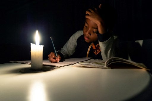 Zim.candlelightafp