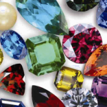 Assorted-coloured-gemstones-1-e1477474715167-696x391-1
