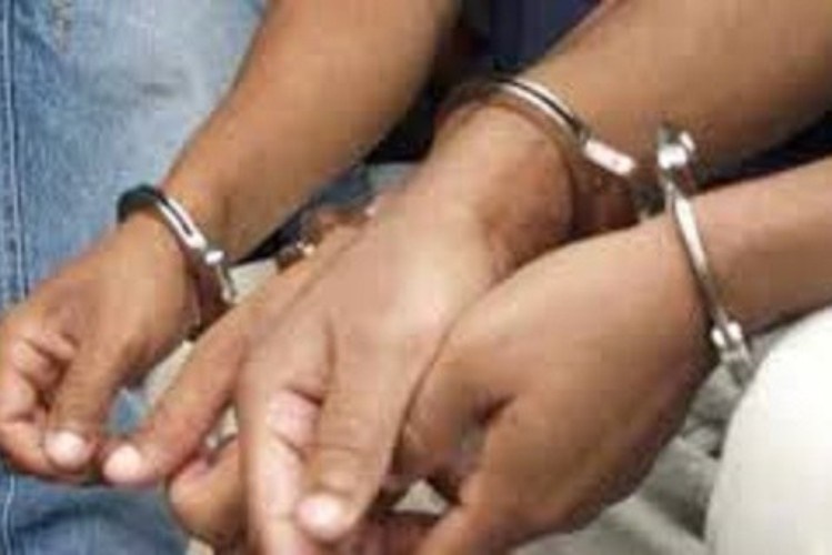 Mhoje_handcuffs_photo_jpg